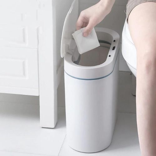 Motion sensor trash can with hands-free lid operation